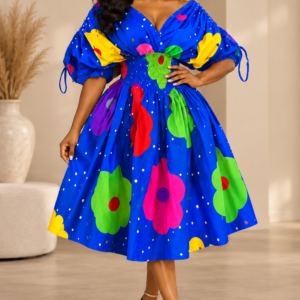 ADERONKE Smocked Batwing Dress